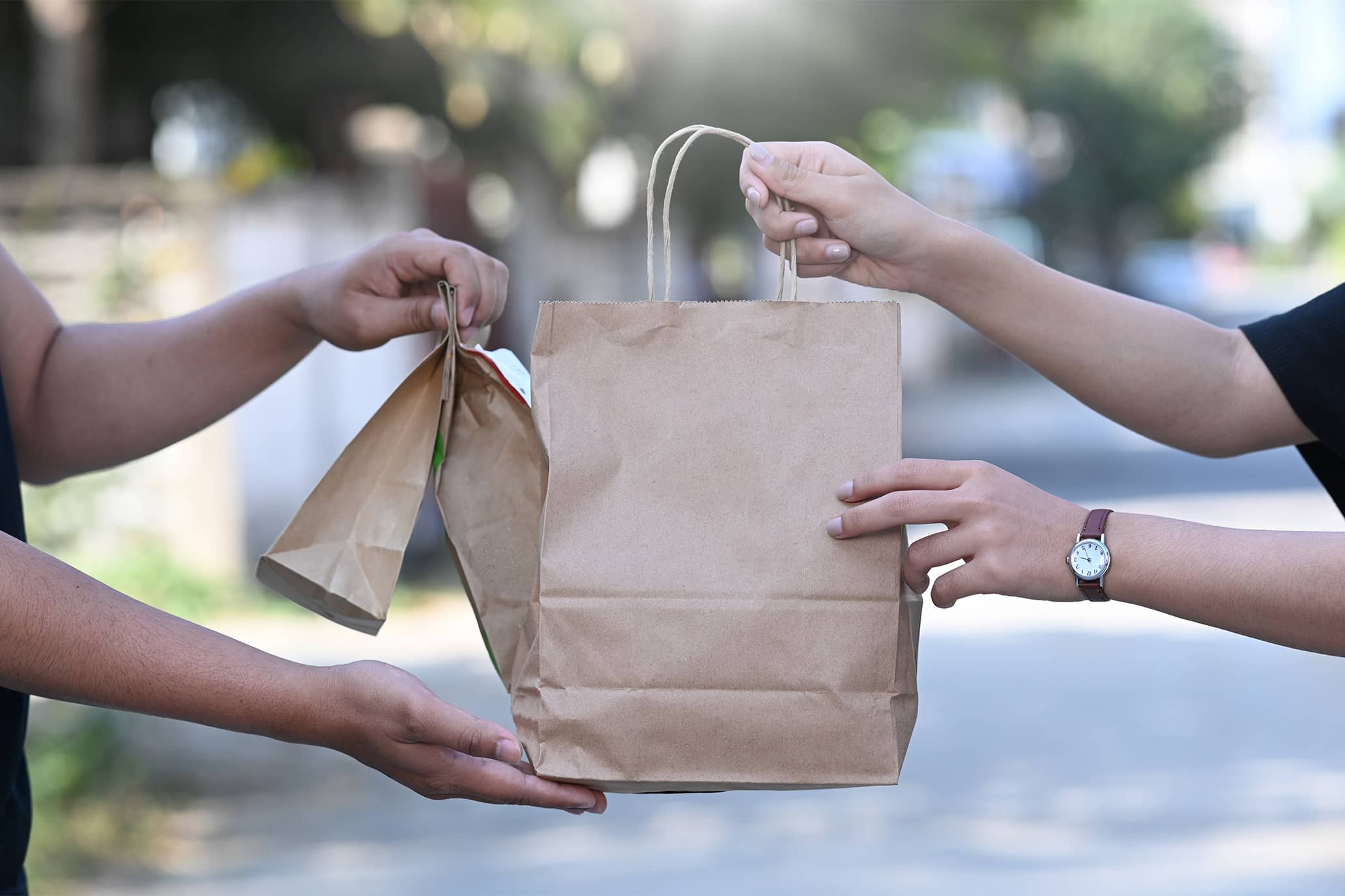 food being delivered in paper bags